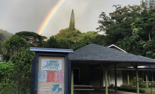 Faint double rainbow above Hawaii Nature Center facilities in Makiki Valley