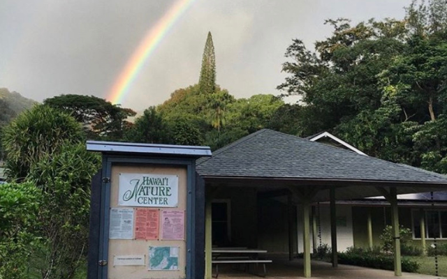 Faint double rainbow above Hawaii Nature Center facilities in Makiki Valley