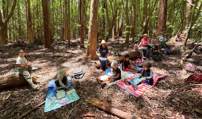 Maui kids in a forest learning and having fun at a Hawai‘i Nature Center program