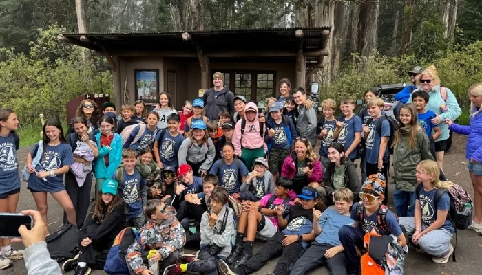 A large ground of Maui schoolchildren poe for a photo.